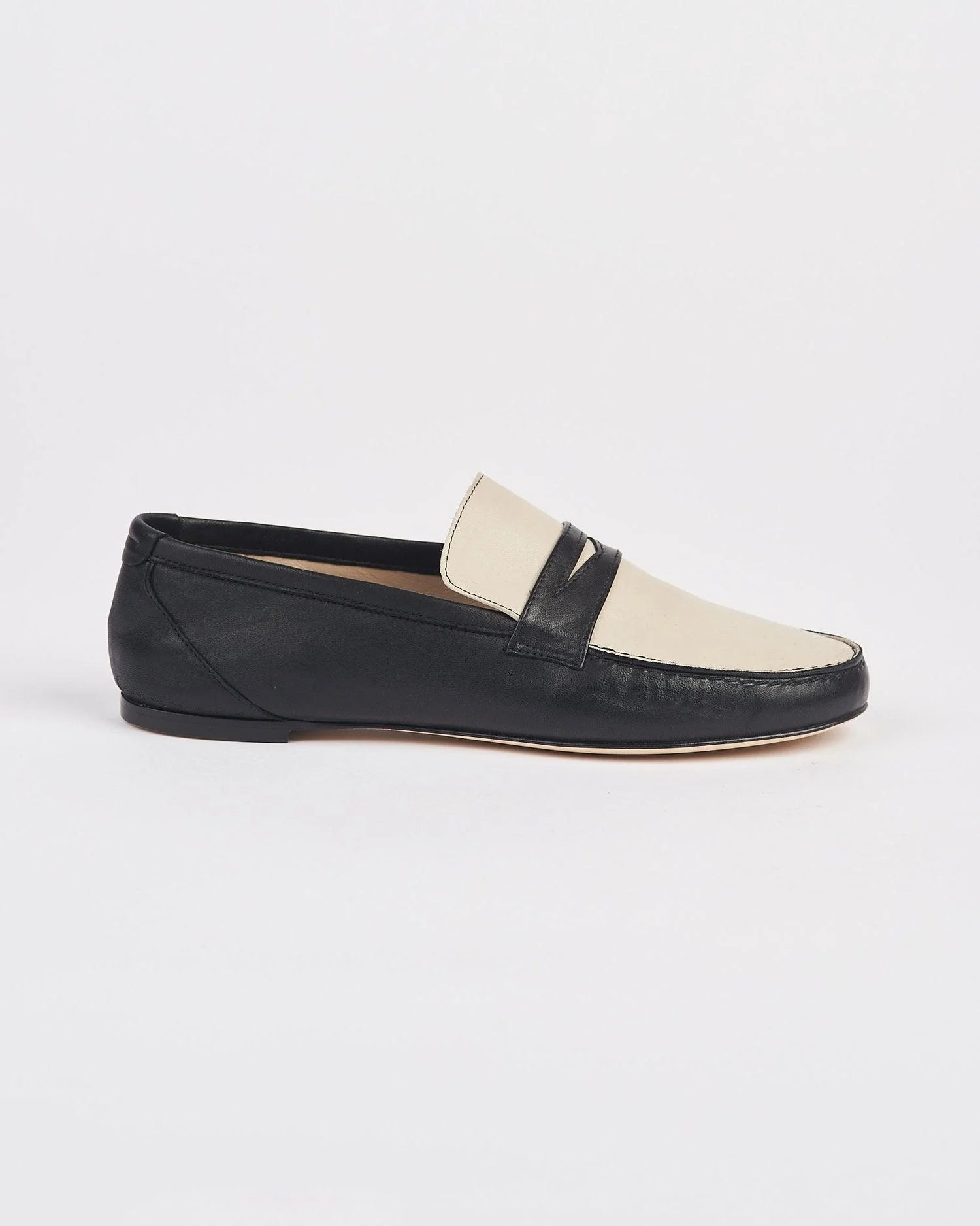 the two tone penny loafer in black & bone.